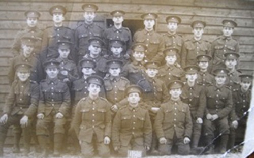 Private De Roche front row centre kneeling